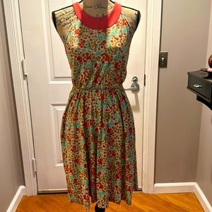 Diane von Furstenburg printed silk dress with cross cross open back. Size 0
